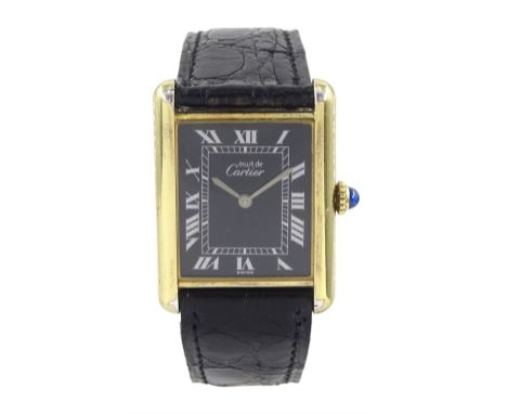 Must de Cartier Tank silver-gilt manual wind wristwatch, black dial with Roman hour markers, hallmarked, on Cartier black lea