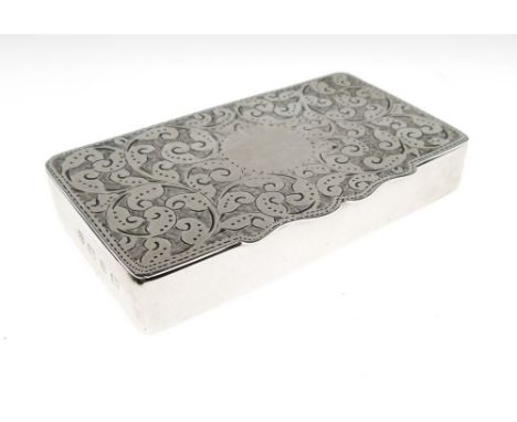 Late Victorian silver snuff box, the oblong cover with shaped front edge and foliate scroll engraving, Birmingham, 1898, spon