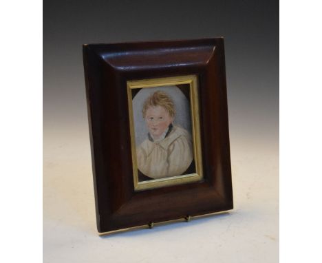 Oval watercolour portrait miniature of a young boy, 11.5cm x 8.5cm, in associated 19th Century frame  