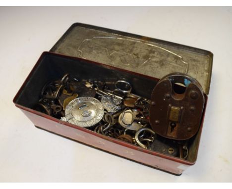 Vintage tin containing a selection of keys and padlocks, metal mount with Royal Arms 'Port of Bristol' etc  