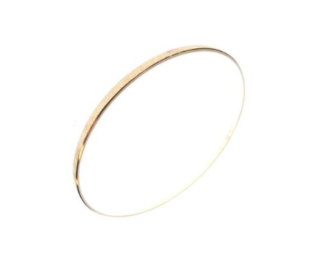 Yellow metal bangle of solid design stamped 14k, 8g approx  