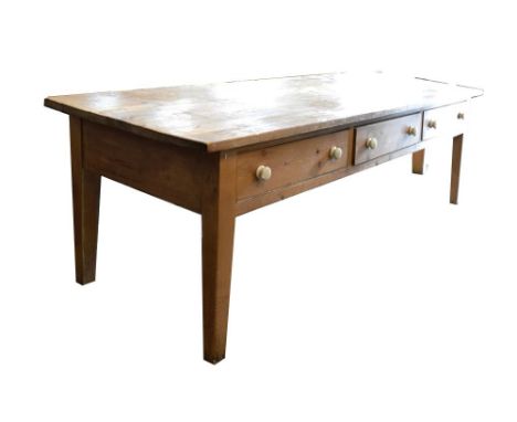 Large scrub top pine farmhouse kitchen table fitted three frieze drawers having ceramic handles, raised on four tapered squar