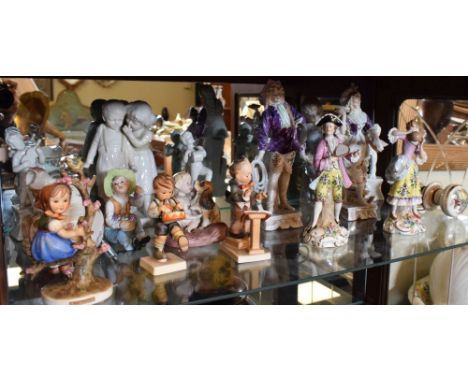 Quantity of porcelain figures including Goebel Hummel etc  