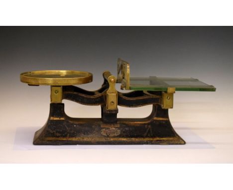 Vintage brass and cast iron shop scale, 49cm wide  