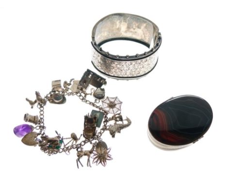 Silver and white metal charm bracelet, banded agate and brass oval box, and Victorian white metal snap bangle (3)  