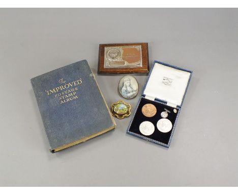 A late 19th century plaque brooch, within gold plated mount, together with an oval portrait miniature on ivory, two '8 Club S