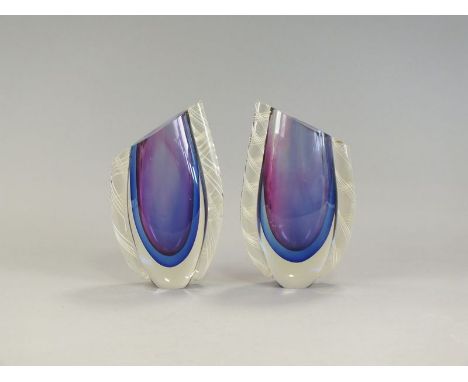 A pair of Swedish glass vases, mid-20th century, the amethyst and blue teardrop centre flanked by latticino threaded detailin