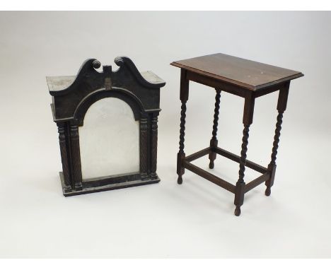 A 19th century mahogany longcase clock hood, with swan neck pediment, the arched door with spiral fluted pilasters flanked by