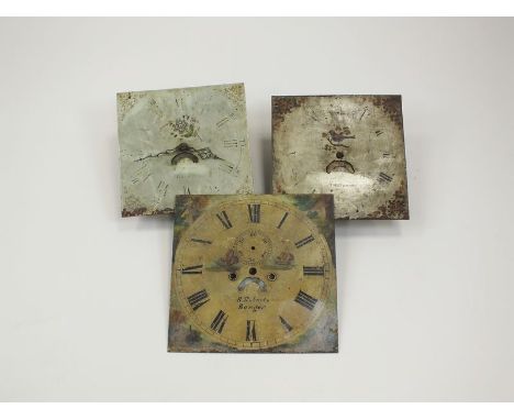 Two 18th century 12" square white painted dials and attached 30-hour movements signed in-distinctively for makers in Newtown 