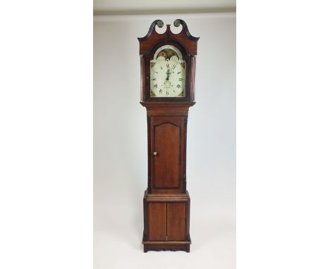 A 19th century oak cross banded painted dial longcase clock, Routledge of Carlisle, the arched dial with marine moon phase an