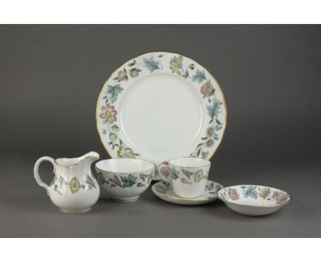 A Royal Worcester Sylvan pattern partial dinner and tea service
