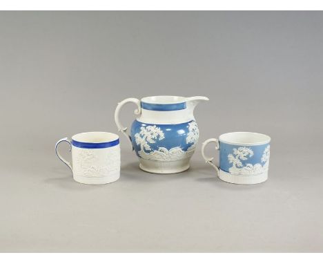 An early 19th century relief moulded stoneware jug, decorated with a hunting scene on blue ground, 15cm high, together with t