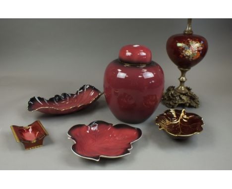 A collection of Carlton Ware Rouge Royale, comprising unusual ginger jar and cover, a table lamp, an ash tray and four differ