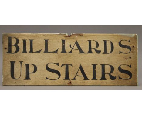 A painted wooden 'Billiards Upstairs' sign. 41 cm wide.