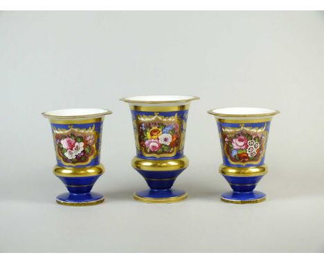 A garniture of three English blue-ground porcelain vasescirca 1820of urn form, painted with panels of flowers within gilded b