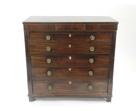 A Victorian mahogany and boxwood strung secretaire chest, having a concealed frieze drawer above a cock-beaded fitted secreta