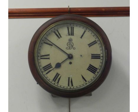 A George V mahogany fusee type circular wall clock, the 12" enamelled dial with black Roman numerals and GvR cypher, 37cm dia