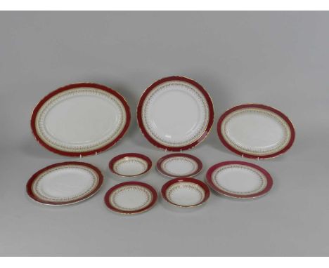 A Royal Worcester ruby 'Regency' dinner servicemid-20th centurycomprising 13 dinner plates, 27cm diameter; 8 plates, 24cm dia