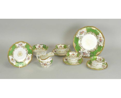 A Coalport green batwing part tea serviceearly 20th centurycomprising seven teacups, six saucers, seven sideplates, cream jug