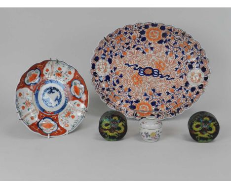 An assembled group of Japanese and Chinese ceramics and enamels, including a lobed oval Imari dish, 38cm, a small Imari dish,