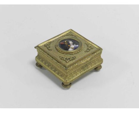 A 19th century French gilt metal jewellery box, the cover inset with an enamel bust portrait of a lady in profile, 6.5cm squa