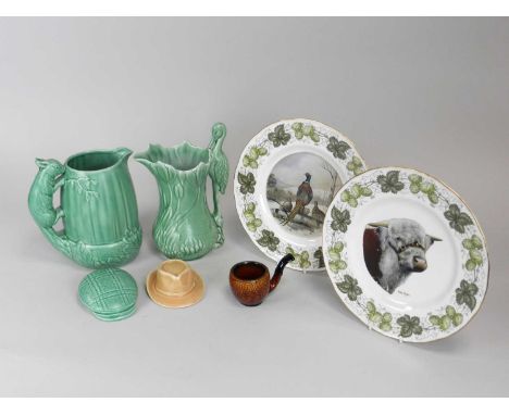 Five pieces of Sylvac to include a green glazed jug with squirrel handle, another similar with stork handle (repaired); a cla