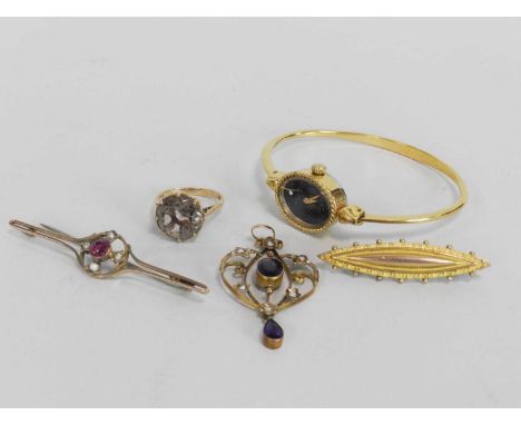 A 9ct gold navette shaped bar brooch, together with a 9ct gold smoky quartz ring, an early 20th century amethyst and seed pea