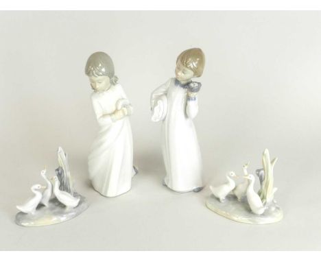 Nao figures of boy and girl at bedtime and two models of geese, printed factory marks (4)