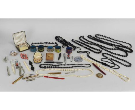 A collection of costume jewellery, to include; a black coral necklace, a graduated bone necklace, French jet necklaces, cut s