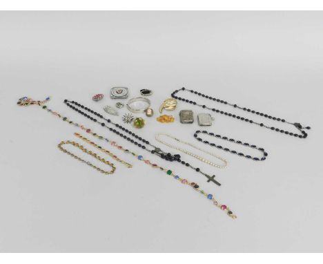 A small collection of costume jewellery, to include; paste brooches, a simulated pearl necklace, a rosary, and a silver bangl