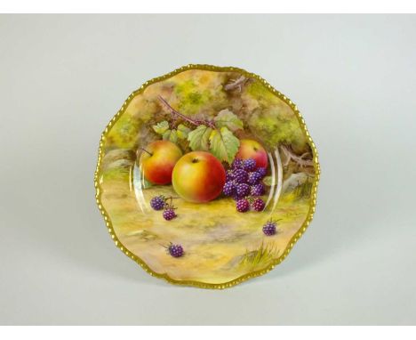 A Royal Worcester cabinet platedated 1925painted with a still life of fruit by T Lockyer, artist signed, printed factory mark
