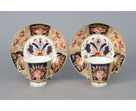 A pair of early 19th century Spode porcelain Imari teacup &amp; saucers (pattern 140); three similar saucers, teacup, &amp; c