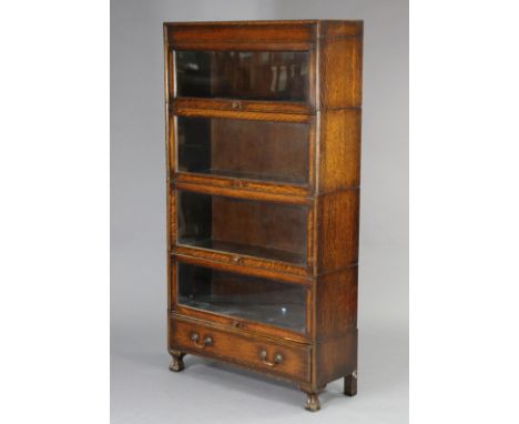 A mid-20th century Globe Wernicke-type sectional bookcase with glazed door to each of the four tiers, fitted with a single lo