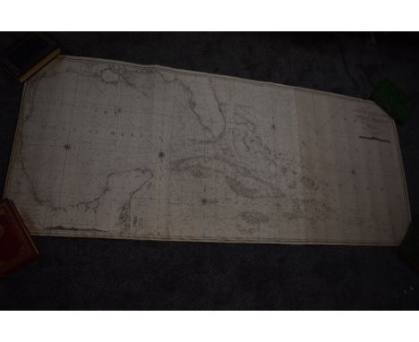 Maritime Collection. A wooden chest containing numerous rolled navigational charts - backed on blue card. Dated early 19th ce