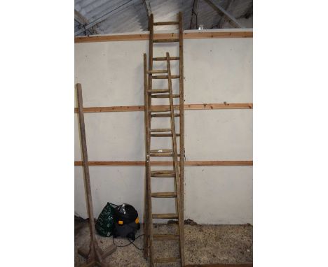 Two wooden step ladders