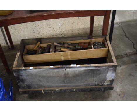 Large wooden toolbox on casters, together with mixed lot of hand tools, saws, spanners, files etc