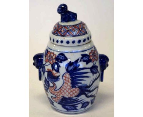Chinese lidded jar with dog finial decorated with Phoenix six character reign mark to base, 16cm high.