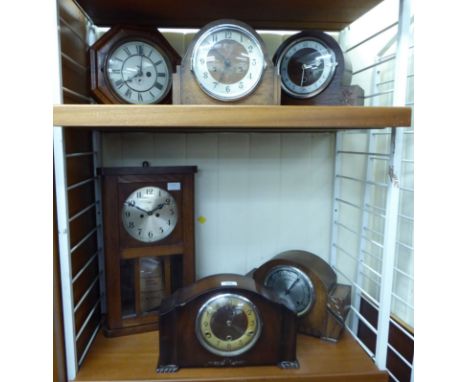 Clocks: to include a late 19thC walnut cased wall clock of octagonal form; the 30 hour movement faced by a painted Roman dial