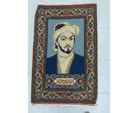 A Persian rug, featuring a head and shoulders portrait of a man  24'' x 38''       CS