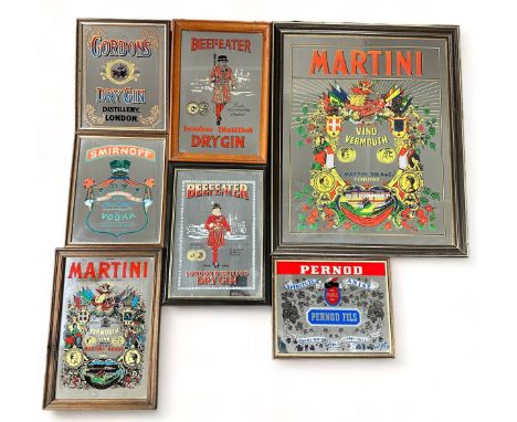 Seven Vintage Alcoholic Spirit Mirror Signs. Gordon's dry gin, Smirnoff, Martini (x2), Beefeater (x2) and Pernod. All framed,