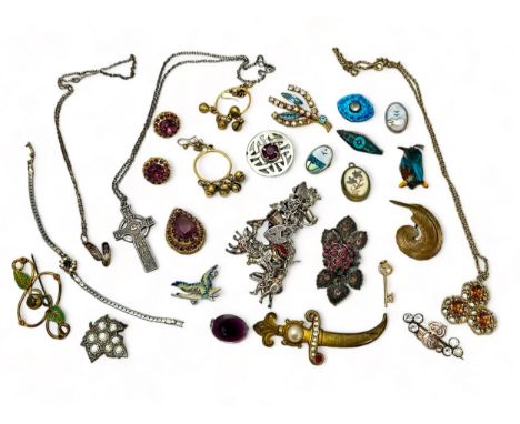 A collection of silver and costume jewellery including a white metal and silver charm bracelet, a silver cross pendant neckla