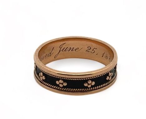A gold and black enamel mourning ring, stamped 15ct. Size O. Inscribed to interior 'Harry, died June 25th 1880, aged 21.' Ple
