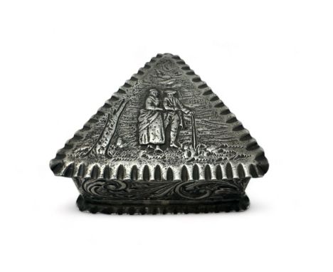 A Victorian triangular silver trinket box with repousse decoration. Marks for C.B , London 1887.Length 6.5cm, weight 45g.