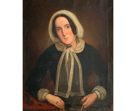 British School, 19th Century competent unsigned oil on canvas portrait of a lady in a bonnet. Framed in ornate gilt frame. 77