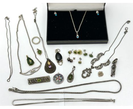 A collection of mostly gem set jewellery items, many stamped 925. Includes a marcasite necklace, gold plated nephrite jade pe