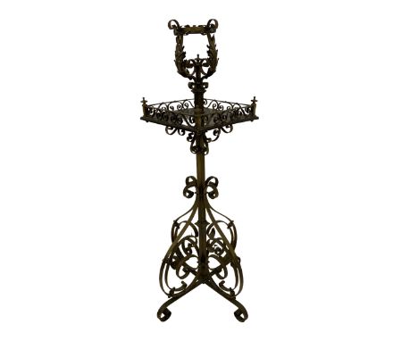 Late 19th century Aesthetic Movement ornate brass standard lamp, the top with scrolling acanthus leaves, the central rosewood