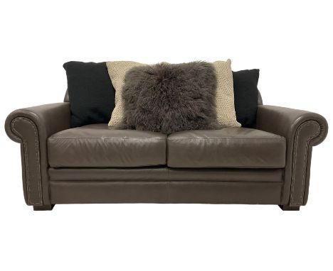 Tetrad - two seat sofa upholstered in brown leather with contrasting scatter cushions Dimensions: Height:&nbsp;72cm&nbsp; Len