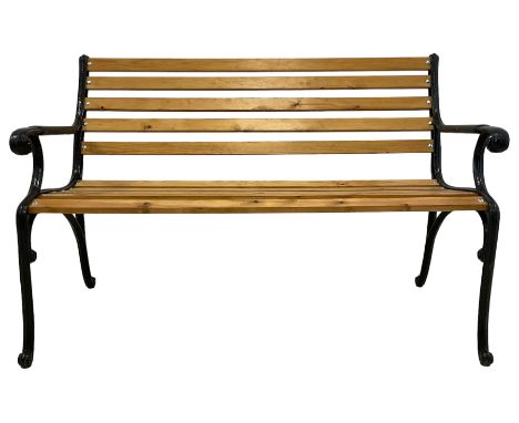 Black painted cast iron and wood slated garden bench Dimensions: Height:&nbsp;84cm&nbsp; Length/Width:&nbsp;125cm&nbsp; Depth