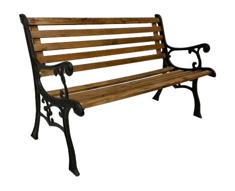 Black painted cast iron and wood slated garden bench Dimensions: Height:&nbsp;80cm&nbsp; Length/Width:&nbsp;124cm&nbsp; Depth