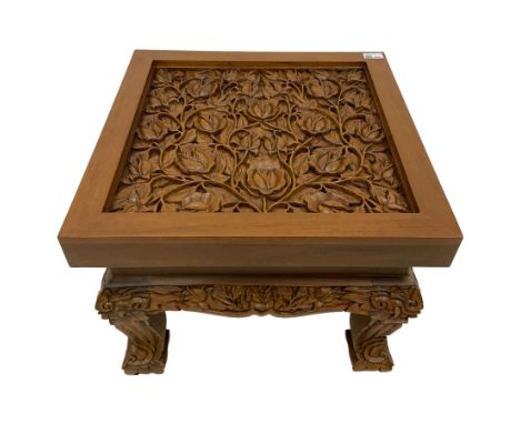 Carved hardwood coffee or lamp table, the square top carved with flower heads and foliageDimensions: Height:&nbsp;41cm&nbsp; 